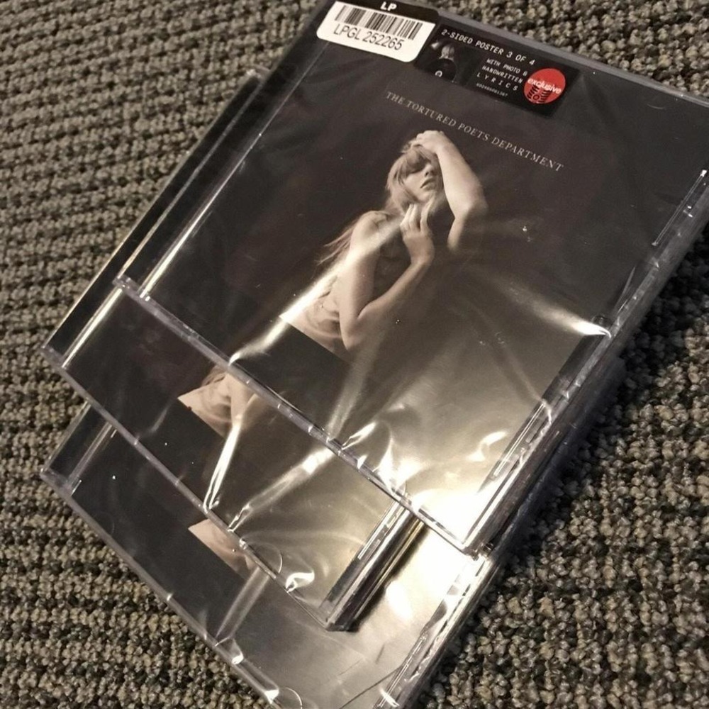 CD titled "The Tortured Poets Department" by Taylor Swift,